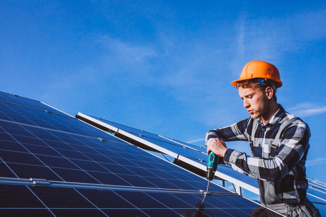man worker firld by solar panels_1303 15593