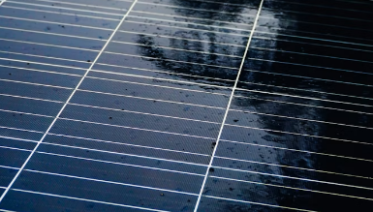 Solar panel surface with morning dew.