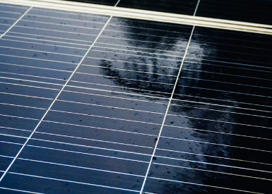 Solar panel surface with morning dew.