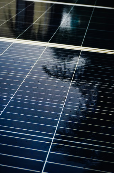 Solar panel surface with morning dew.