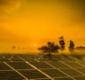 Solar panels installed on a rooftop covered in light fog conditions