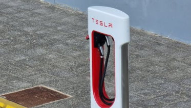 A single Tesla Powerwall unit installed.