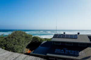 A beautiful seaside house with solar panels overlooking the ocean