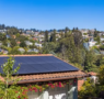 Modern home with rooftop solar panels.