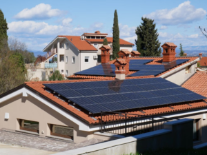 home with a completed rooftop solar panel installation on a sunny day