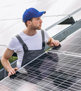 A person installing solar panels.