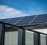 A huge number of solar panels lined up together.