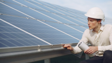 Solar contractor reviewing residential roof for solar installation Title: Solar Contractor Roof Assessment